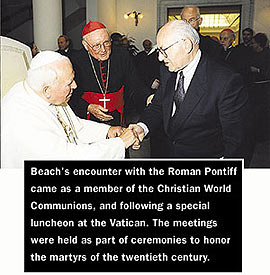 Dr. Bert Beach literally grasps the Pope's hand-- a lasting symbol.